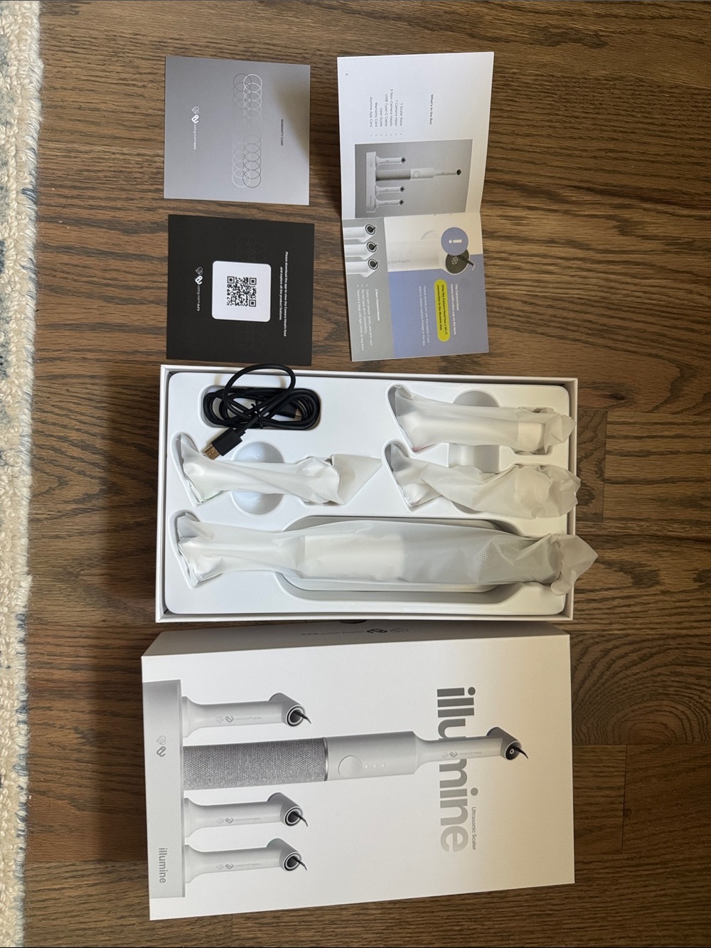 White Electric Facial Cleansing Brush with Interchangeable Heads